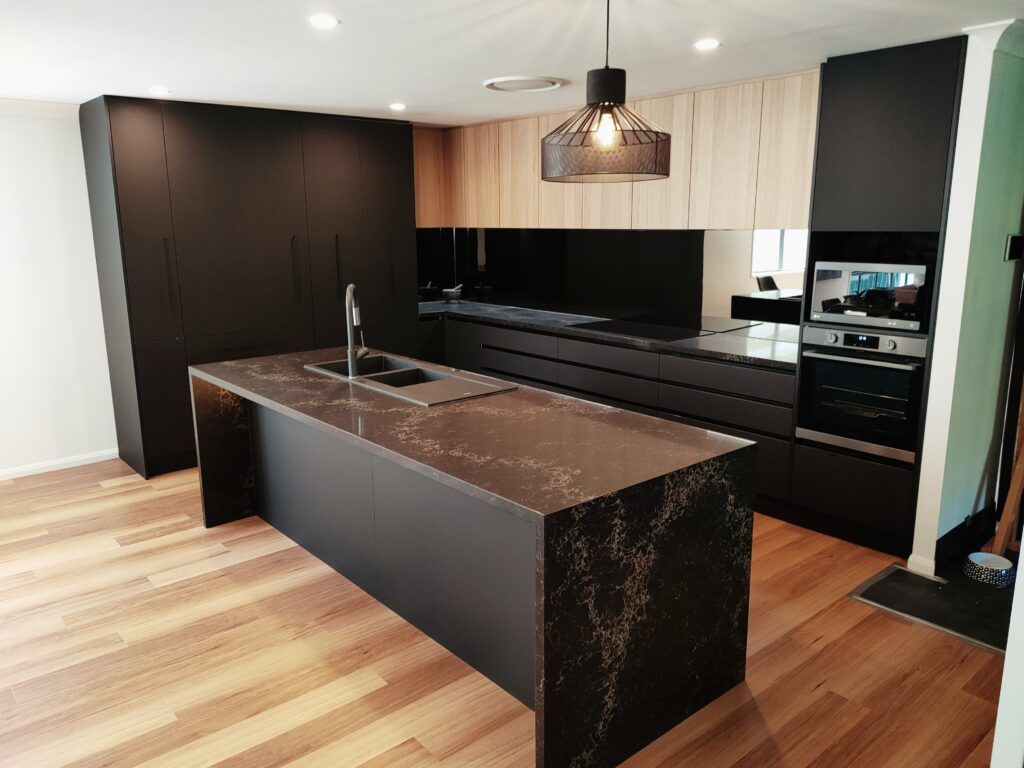 Black finger pull with natural oak overheads